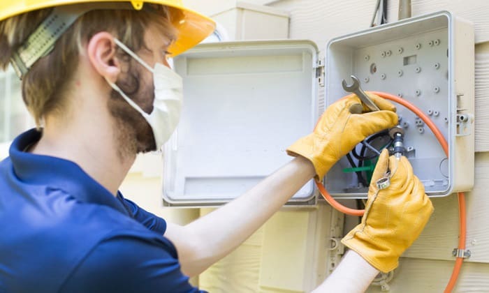 wear rubber gloves when working with electricity