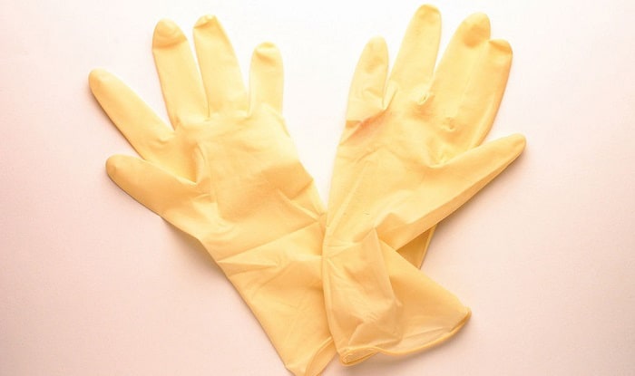why do latex gloves turn yellow