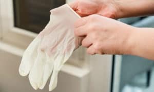 how to put on gloves with sweaty hands